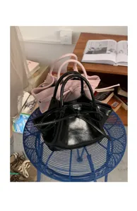 Borsa a secchiello chic con fiocco da donna, borsa in pelle PU alla moda dettaglio.