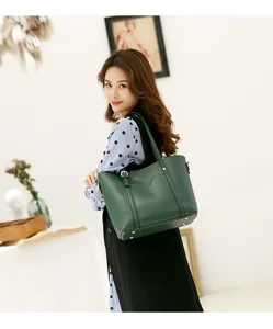 Dark green soft leather tote bag detail view, spacious shoulder bag for daily elegant use.
