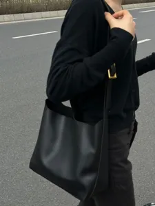Minimalist black slouchy bucket shoulder bag, casual large capacity PU leather crossbody bag.