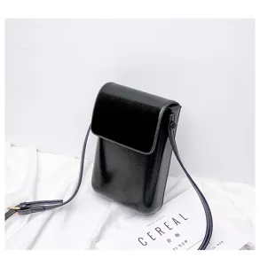 Detail view of the black mini vertical crossbody phone bag, minimalist retro design for daily use.