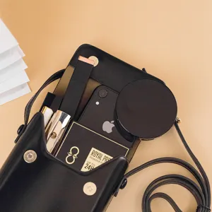 Minimalist black vertical phone crossbody bag, versatile mini retro leather bag for daily use.
