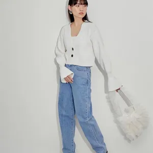 Detailed view of the Japanese niche design tulle pleated shoulder tote bag in white color style.