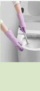 Detail view of durable purple household cleaning rubber gloves for kitchen and bathroom.