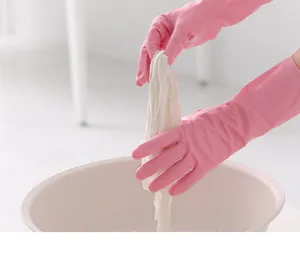 Pink rubber household cleaning gloves detail showing waterproof and anti-slip dishwashing use.