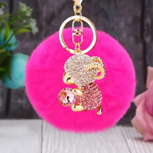 Charming rhinestone sheep plush pom pom keychain, cute pink bag charm with gold keyring.