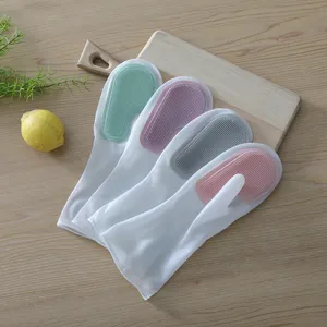 Multifunctional silicone dishwashing gloves with built-in scrubbing brushes for kitchen use.