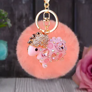 Cute pink plush sheep keychain with sparkling rhinestones and gold metal clasp for bag decor.