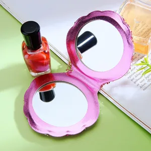 Rhinestone folding mirror keychain detailed view, cute pink bag charm accessory.