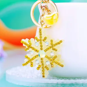 Sparkling rhinestone snowflake keychain with gold keyring and cute yellow heart charm accessory
