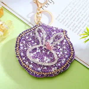 Rhinestone bunny ear shell mirror keychain, purple cute bag pendant and portable makeup tool.