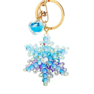 Blue rhinestone snowflake keychain for women, sparkly crystal bag charm and metal car key ring.