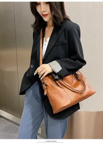 Stylish brown leather shoulder bag for women, featuring a chic tote design and hardware.