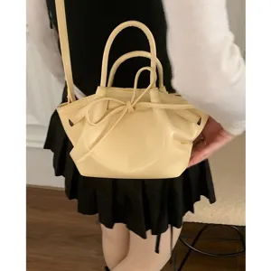 Borsa secchiello giallo chiaro con fiocco donna tendenza stile coreano borsa a tracolla casual