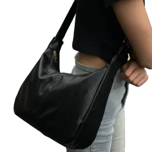 Classic black slouchy hobo shoulder bag for women, large capacity casual daily commuter tote.