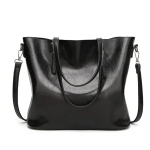 Classic black patent leather tote bag for women, stylish large capacity shoulder handbag.