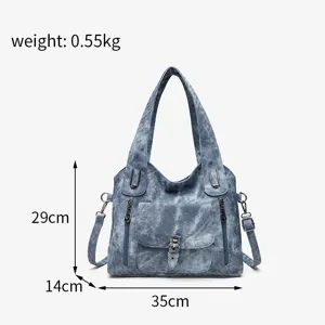 Detailed close-up view of vintage washed denim women shoulder bag with multi-pocket design