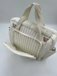 White quilted diaper bag with cute bear embroidery, large capacity tote shoulder bag for moms.