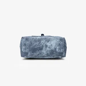 Bottom detail view of vintage washed denim canvas casual handbag showing sturdy stitching.