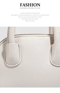 Detailed view of the stylish dome handbag featuring premium leather texture and smooth zipper.