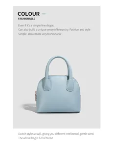 Light blue stylish shell handbag detail view, minimalist design for daily fashion and chic style.