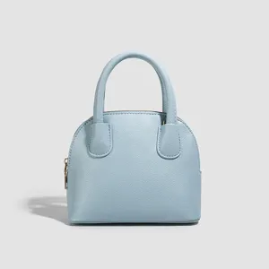 Light blue dome handbag for women, chic retro shell bag with top handle and design.