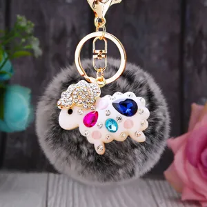 Close-up detail of the cute rhinestone sheep fluffy keychain, showcasing sparkling crystal gems.