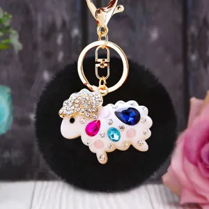 Cute rhinestone sheep keychain with black fluffy pom-pom metal ring bag charm cute gift.