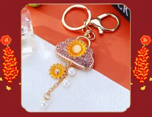 Exquisite sunflower bag keychain, metal rhinestone purse charm with pearls for keys and bags.