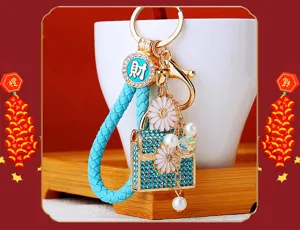 Rhinestone daisy bag keychain for car keys, stylish blue braided ring pendant gift.
