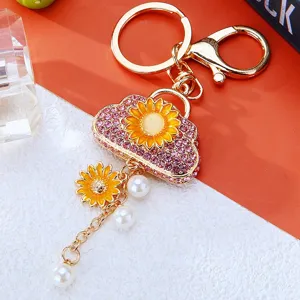 Cute sunflower rhinestone handbag keychain, golden metal ring and pearl charm for bags.