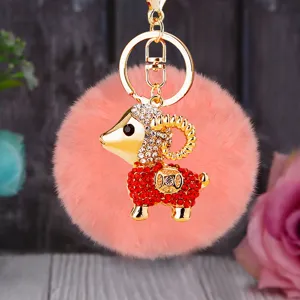 Cute fluffy ram plush keychain with sparkling rhinestones and metal ring for bag charm.
