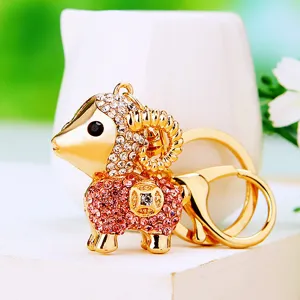 Cute rhinestone sheep metal keychain detail shot, gold tone bag charm pendant for women.