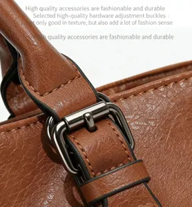 Women soft leather handbag tote bag detail view, premium metal adjustment buckle and durable strap.