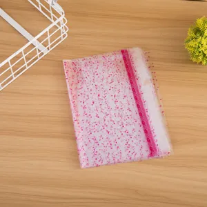 Transparent printed plastic gift bag for plush toys and dolls, lightweight and clear packaging.