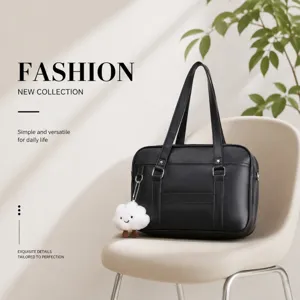 Detailed view of the black JK style shoulder tote bag featuring exquisite details and hardware.