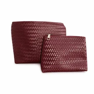 Burgundy woven leather handbag set, chic tote and zippered pouch for women daily casual wear.