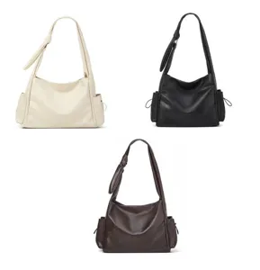 Detail view of large capacity vintage shoulder hobo tote bag with chic side pockets and folds.