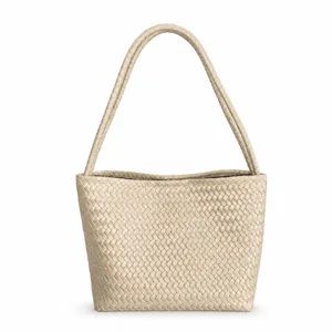 Detailed view of the beige woven leather shoulder bag, premium intrecciato style tote purse.