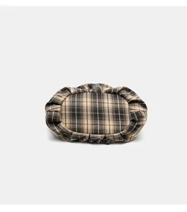Vintage plaid canvas shoulder tote bag bottom detail, aesthetic textured fabric design.