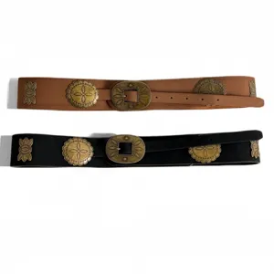 Western vintage style women belt featuring bronze metal buckle and floral concho details.