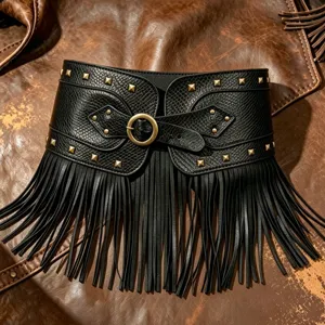 Detailed close-up of a vintage black wide leather belt featuring metal rivets and long fringe tassels.