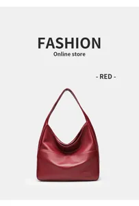 Red large capacity vintage shoulder tote bag for women with zipper and PU leather material.