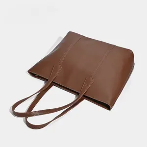 Brown leather tote bag for women, large capacity shoulder bag for daily commuting and office.