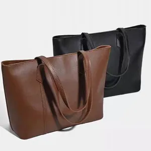 Classic large capacity leather shoulder tote bag for women, elegant daily commute handbag.