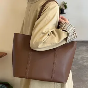 Classic brown large capacity shoulder tote bag for women, retro commuter casual handbag.