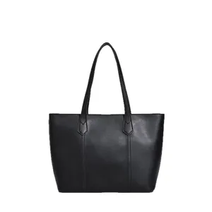 Large capacity black shoulder tote bag for women, retro versatile commuting handbag.