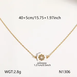 Minimalistische Blumenkette Detail aus Titanstahl, zarte goldene Kette mit weissem Anhänger.