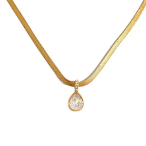 Gold herringbone chain necklace featuring a stunning teardrop crystal pendant for women.