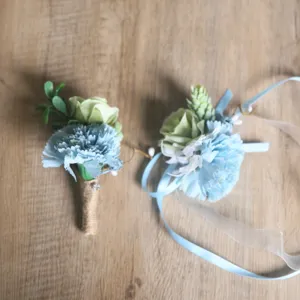 Forest style artificial carnation boutonniere and wrist flower set for wedding groomsmen.