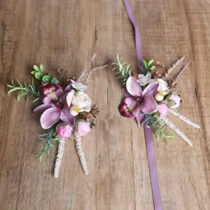 Pink purple floral corsage and wrist flower set for wedding bride groom celebration decor.